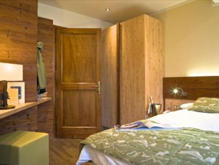 Postel nebo postele na pokoji v ubytování Hotel Pangrazzi - 3 stelle superior
