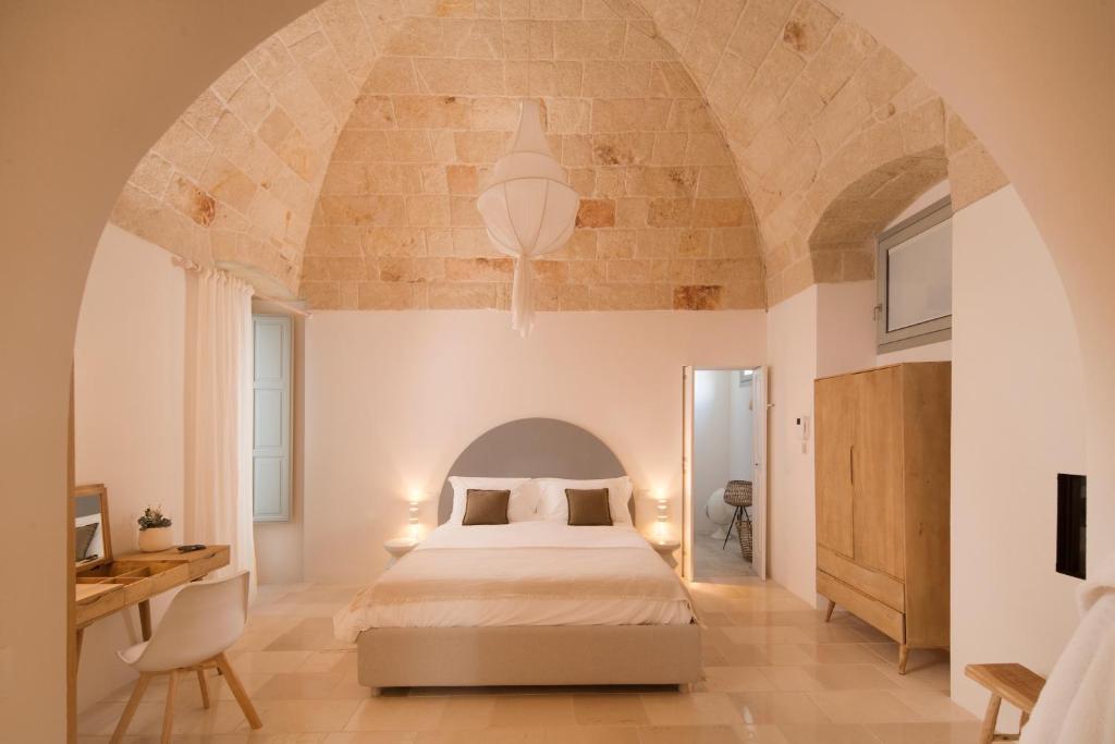 A bed or beds in a room at Palazzo Manzoni by MANZONI COLLECTION