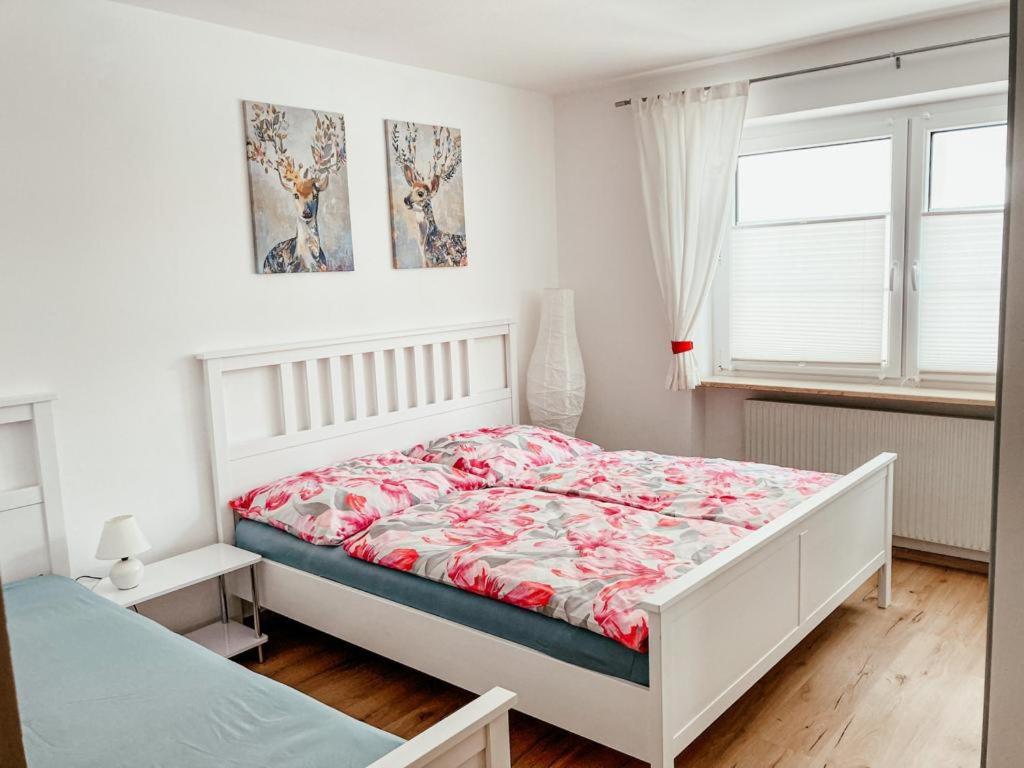 Łóżko lub łóżka w pokoju w obiekcie Ferienwohnung Olympia Axams