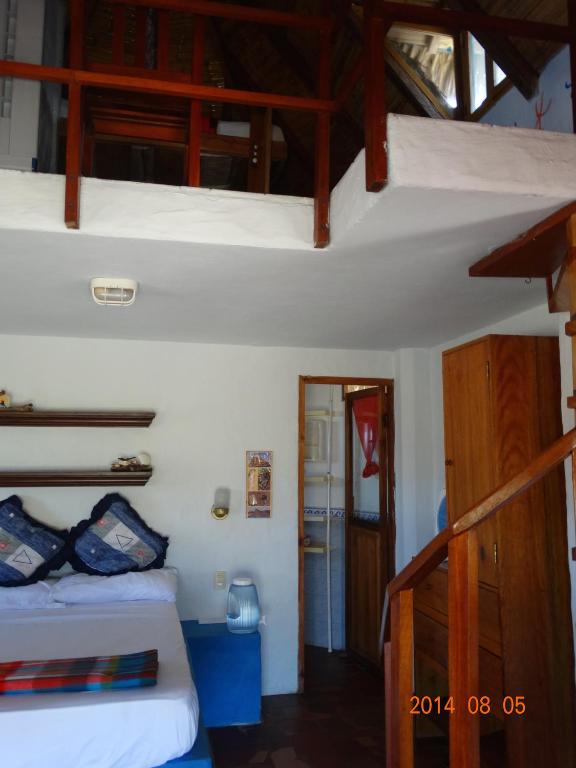 Postel nebo postele na pokoji v ubytování Hosteria Tsafiki