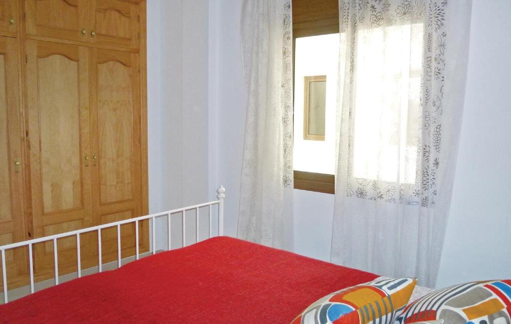 Łóżko lub łóżka w pokoju w obiekcie Cozy Home In Nerja With Wifi