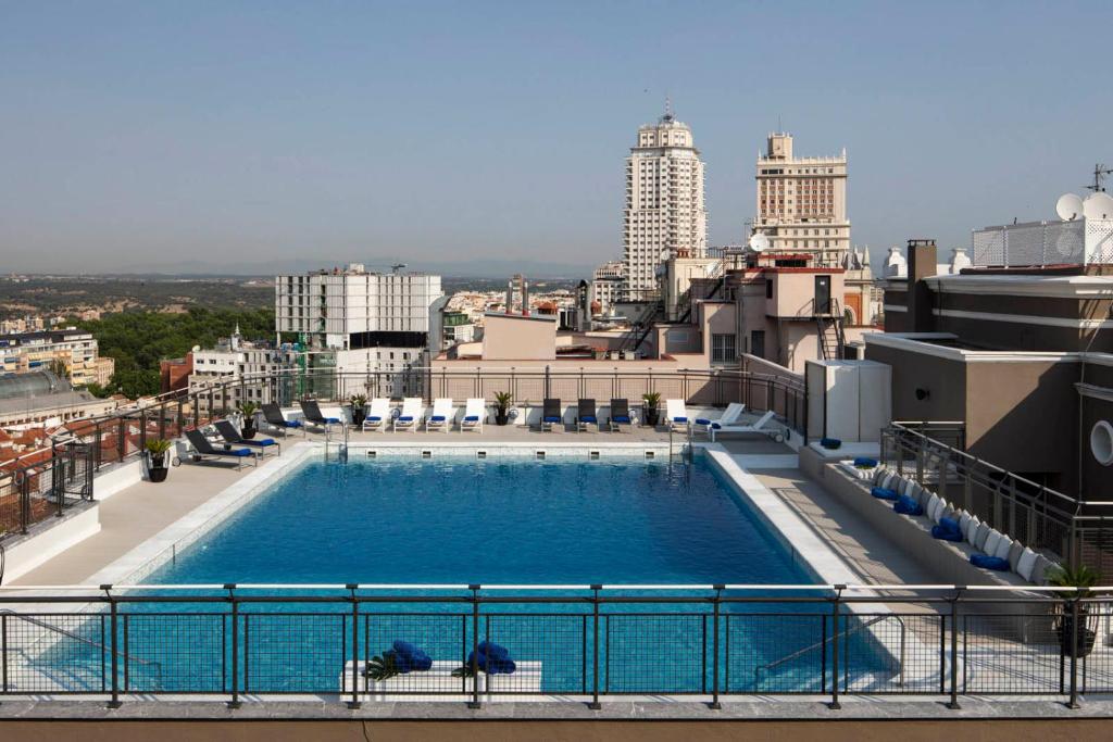 a large swimming pool on top of a building at Emperador in Madrid