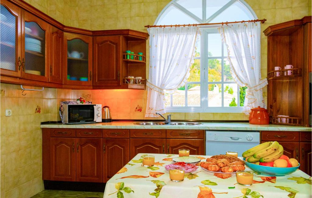 Kuchyň nebo kuchyňský kout v ubytování Villa Ana Maria
