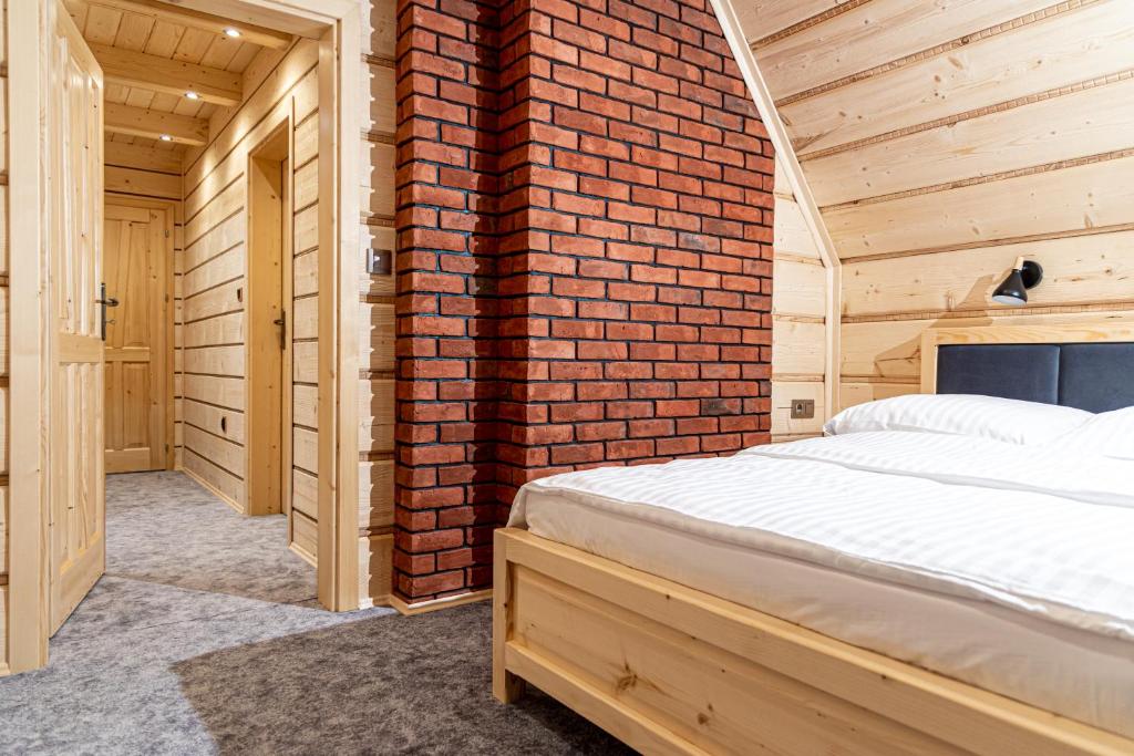 Posteľ alebo postele v izbe v ubytovaní Bajka Chateau