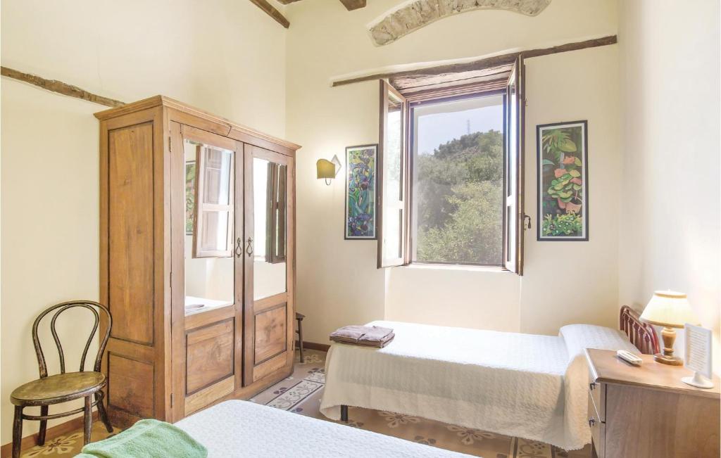 A bed or beds in a room at Casale Malena