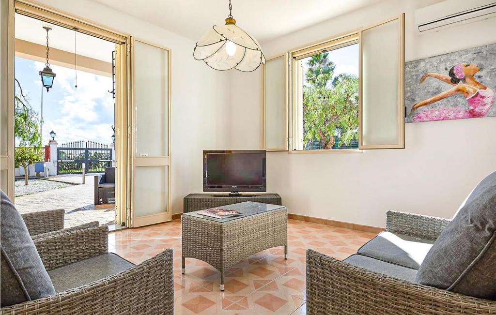 A television and/or entertainment centre at Villa Natalia