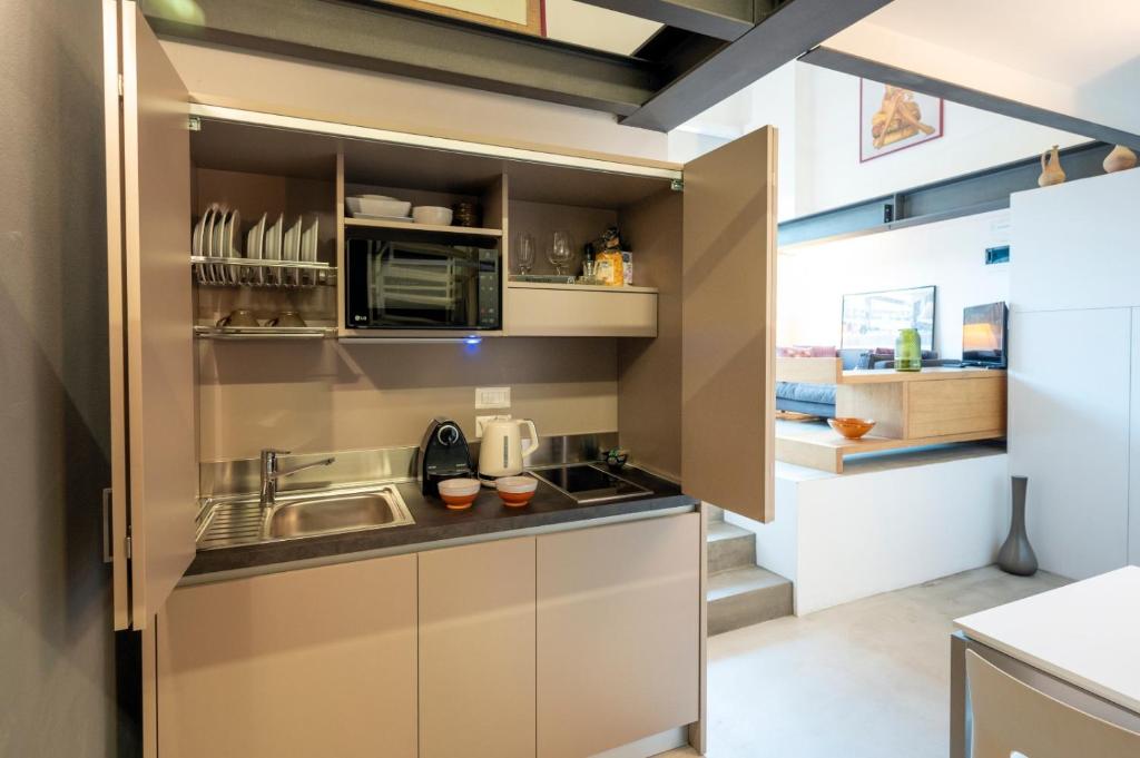 Kuchyňa alebo kuchynka v ubytovaní Loft 19