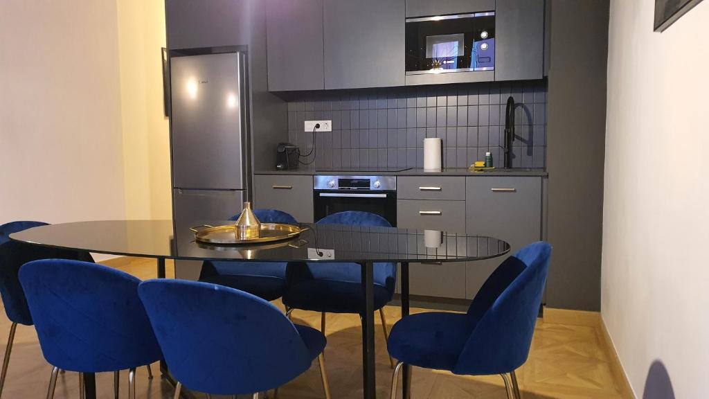 Kuchyň nebo kuchyňský kout v ubytování Barrio Gotico Apartments Escudellers