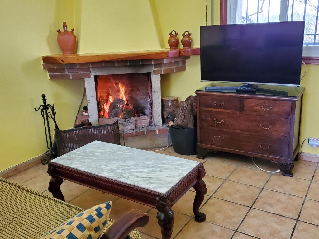 TV a/nebo společenská místnost v ubytování Villa Peregrina