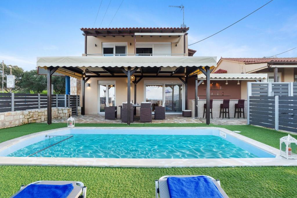 Bazén v ubytování Nikos Dimitra Luxury Home BY APOKORONAS-VILLAS nebo v jeho okolí