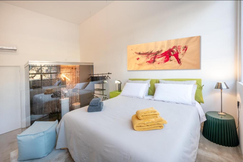 Posteľ alebo postele v izbe v ubytovaní Loft 19