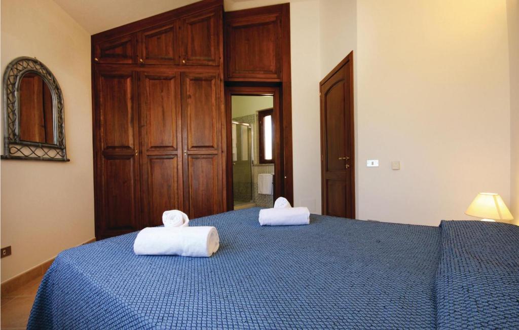 Łóżko lub łóżka w pokoju w obiekcie Cozy Home In Costa Rei -Ca- With Wifi