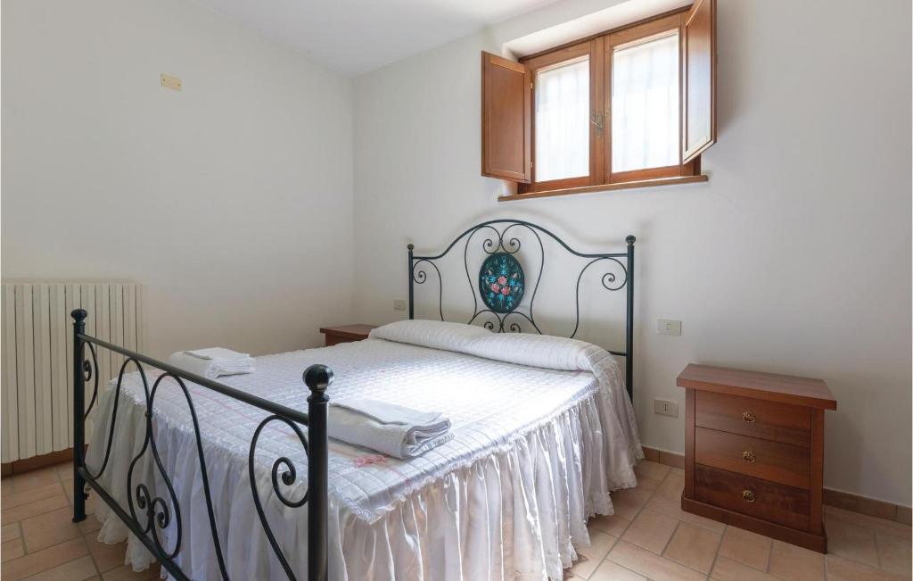 Posteľ alebo postele v izbe v ubytovaní Cozy Apartment In Giano Dellumbria Pg
