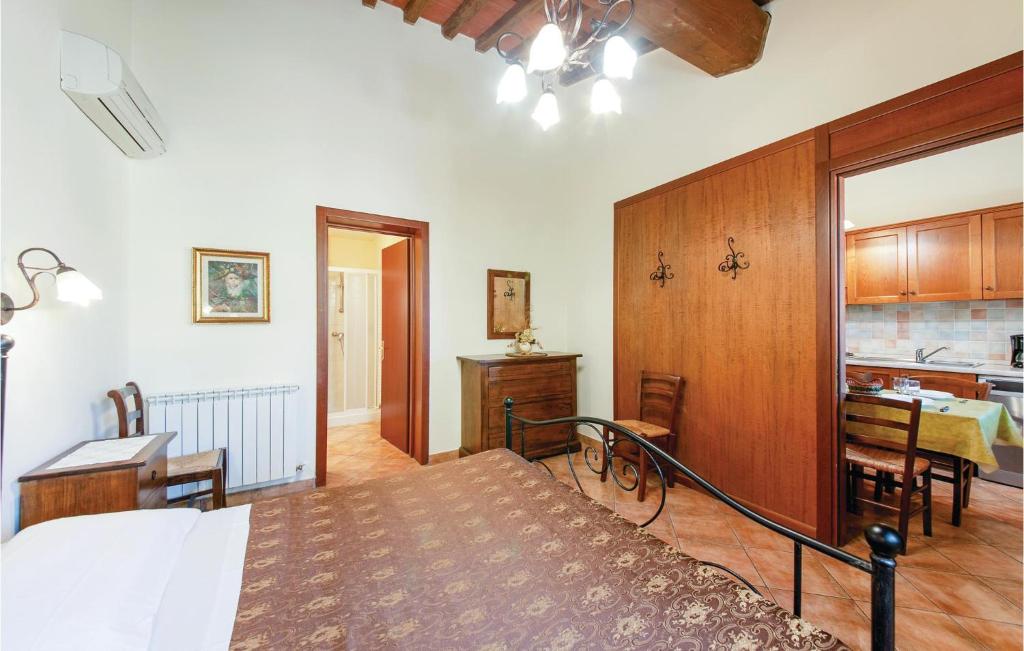 Postel nebo postele na pokoji v ubytování Corte Ponziani 1