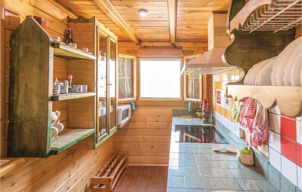 Kuchyň nebo kuchyňský kout v ubytování Wooden Dreamhouse Arriate