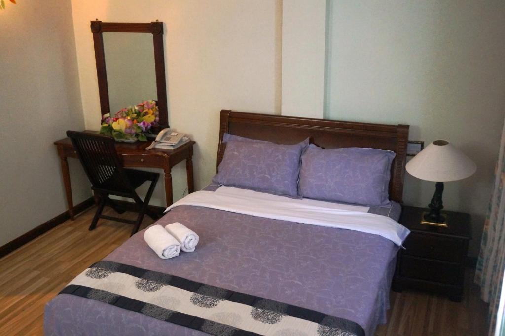 Postel nebo postele na pokoji v ubytování Jeruton Hotel