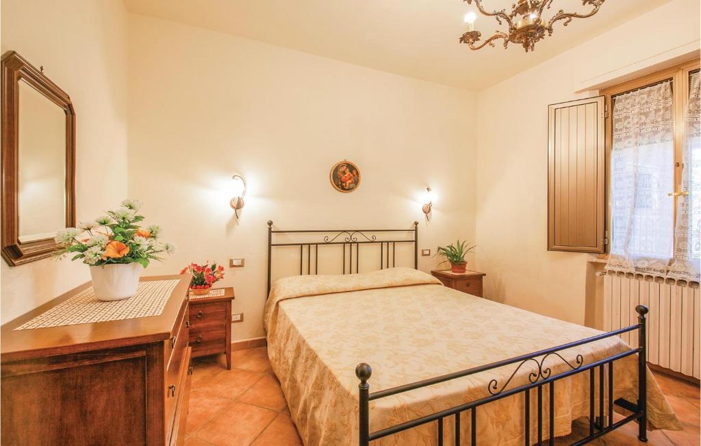 Postel nebo postele na pokoji v ubytování Corte Ponziani 2