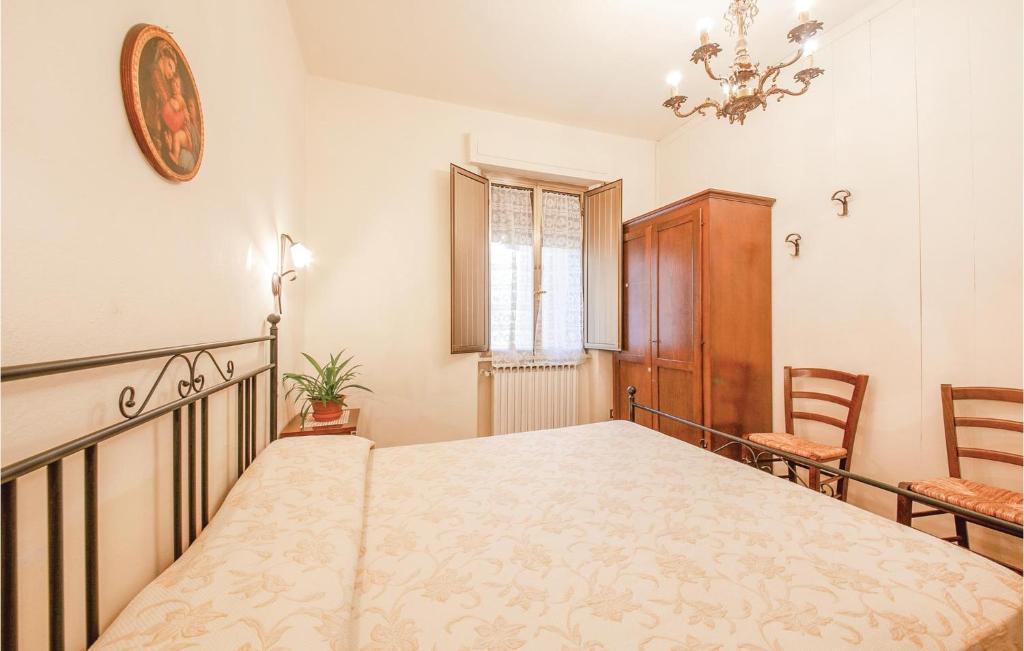 Postel nebo postele na pokoji v ubytování Corte Ponziani 2