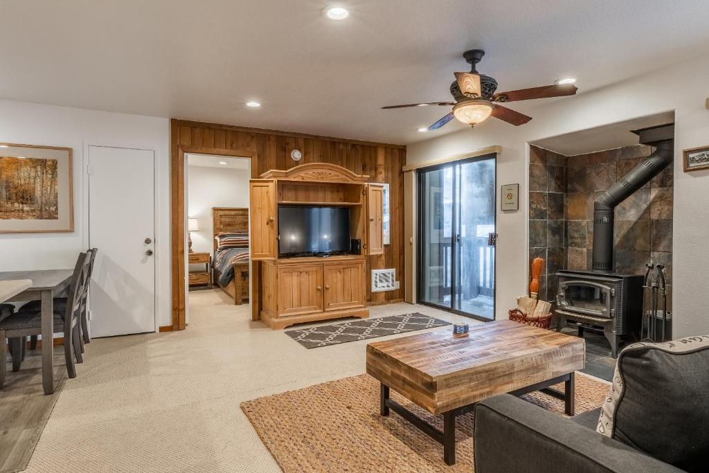 a living room with a couch and a table at Hidden Valley Village #103 nicely updated 1 bedroom 1 bathroom condo short 10 min walk from Village in Mammoth Lakes