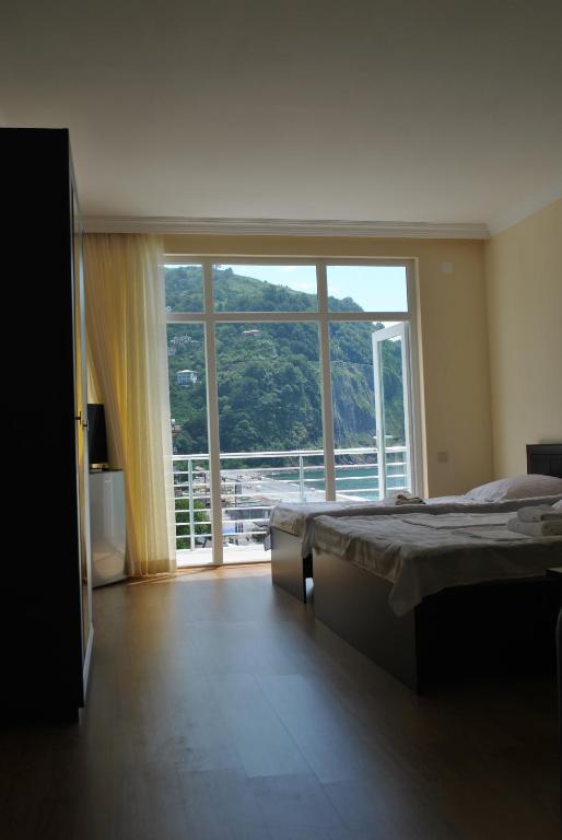 Postel nebo postele na pokoji v ubytování Black Sea Hotel
