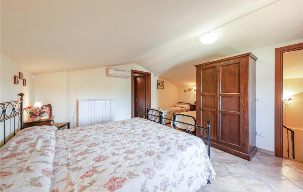 Postel nebo postele na pokoji v ubytování Corte Ponziani 3