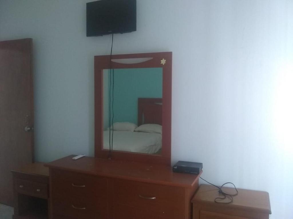 TV a/nebo společenská místnost v ubytování Hotel Azulejos