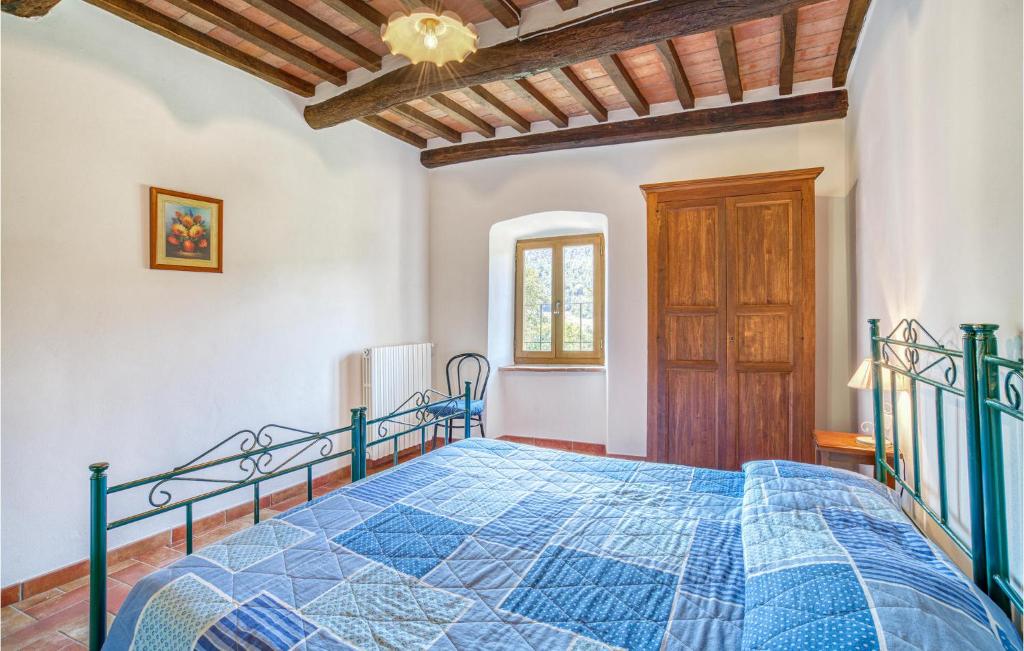 Letto o letti in una camera di Le Caselle