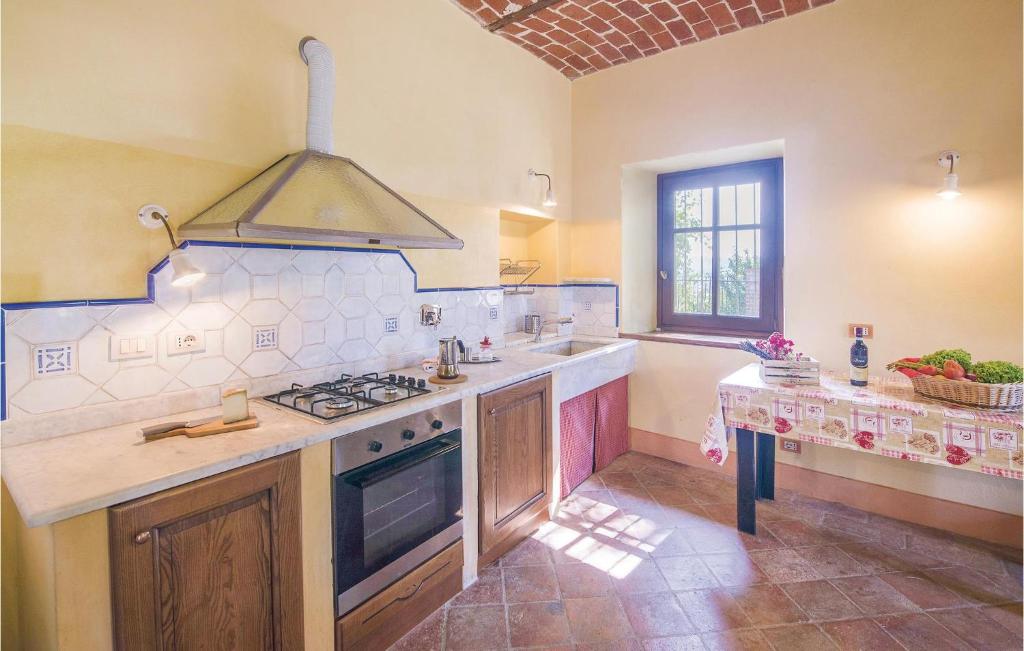 Kuchyňa alebo kuchynka v ubytovaní Casa I Fiordalisi