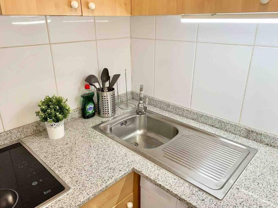 Kuchyňa alebo kuchynka v ubytovaní Precioso apartamento en el Casco Vello de Vigo