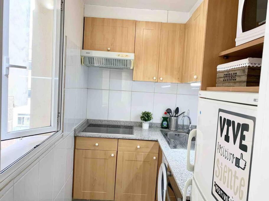 Kuchyňa alebo kuchynka v ubytovaní Precioso apartamento en el Casco Vello de Vigo