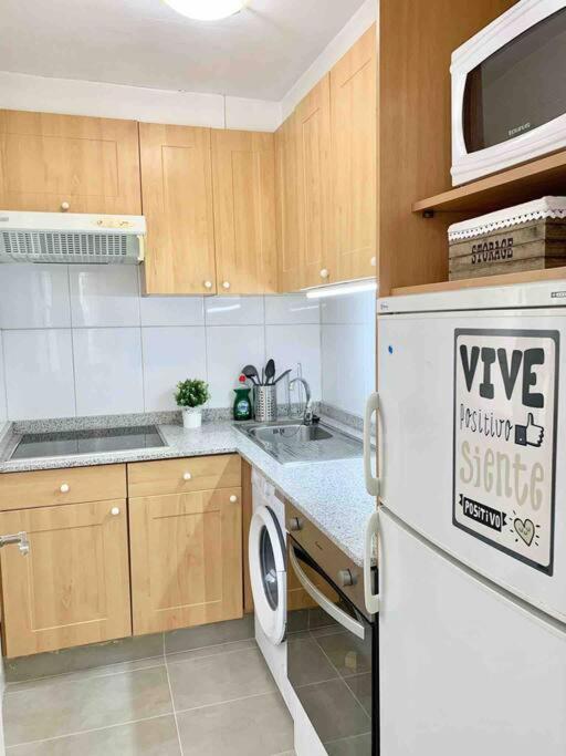 Kuchyňa alebo kuchynka v ubytovaní Precioso apartamento en el Casco Vello de Vigo