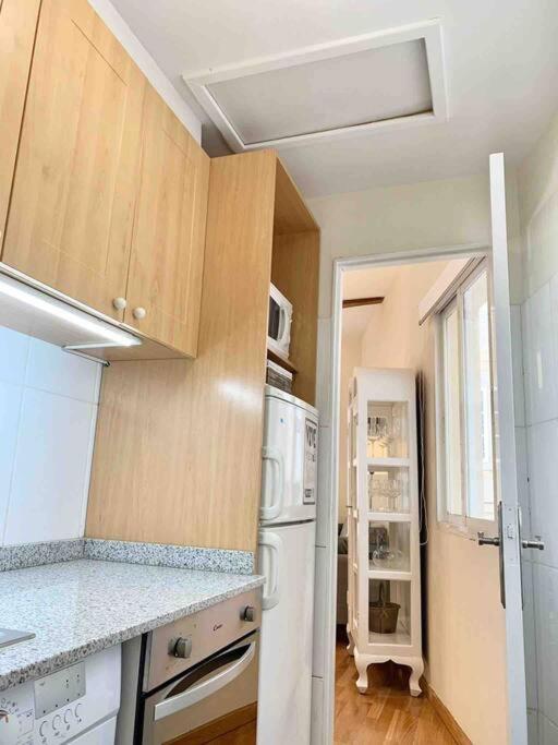 Kuchyňa alebo kuchynka v ubytovaní Precioso apartamento en el Casco Vello de Vigo