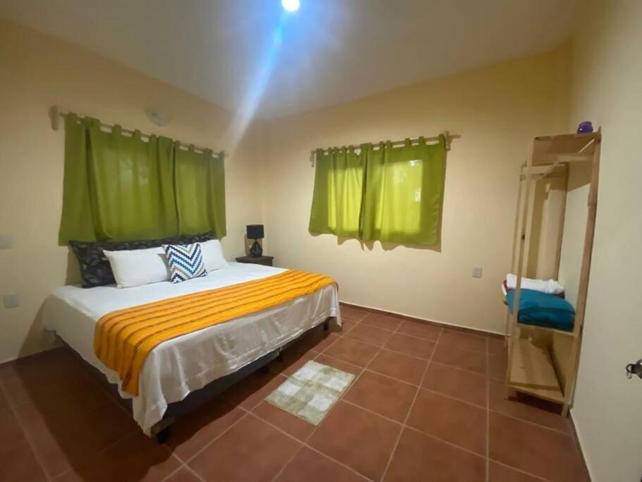 Postel nebo postele na pokoji v ubytování Casa SanMar cerca de la playa