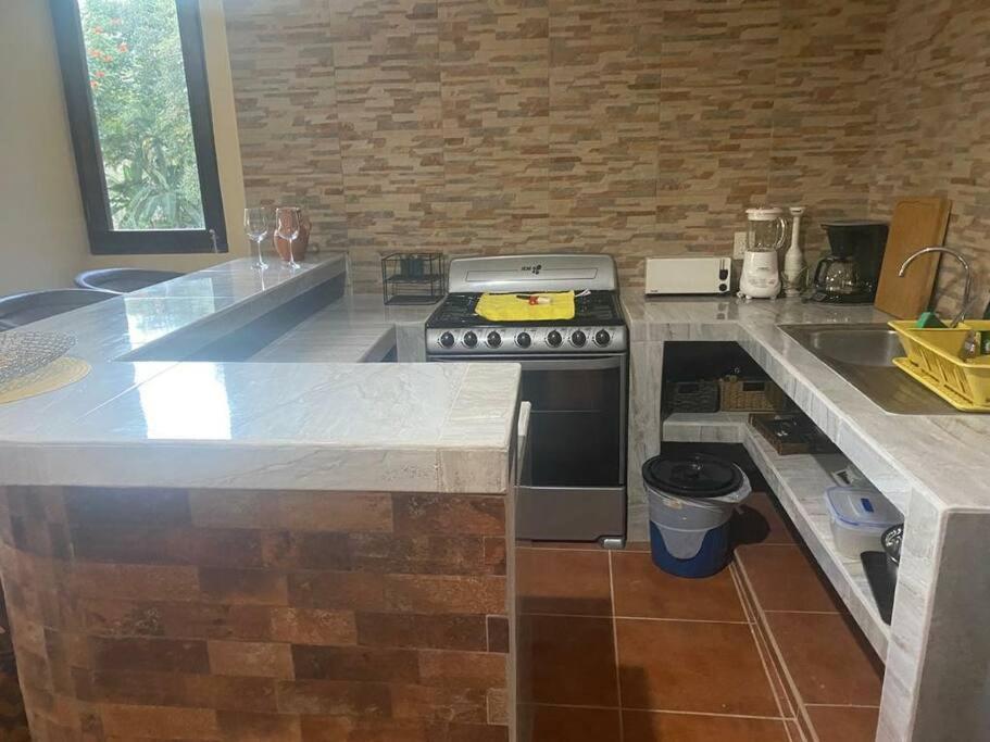 Kuchyň nebo kuchyňský kout v ubytování Casa SanMar cerca de la playa