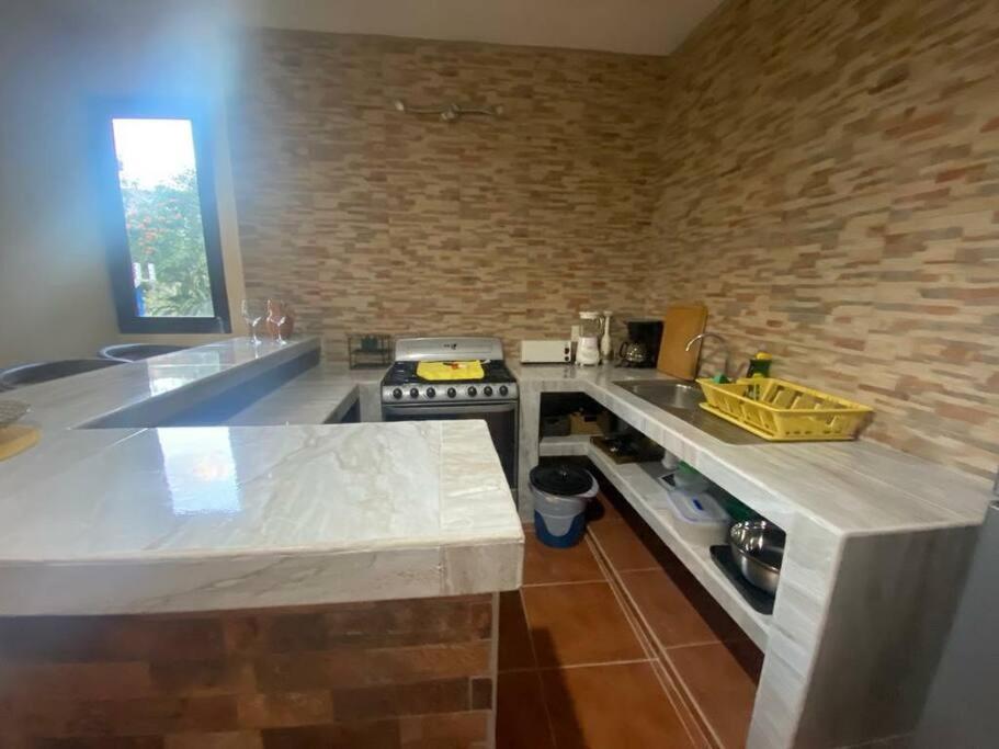 Kuchyň nebo kuchyňský kout v ubytování Casa SanMar cerca de la playa