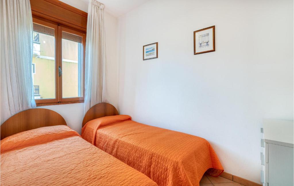 A bed or beds in a room at Aragosta 4