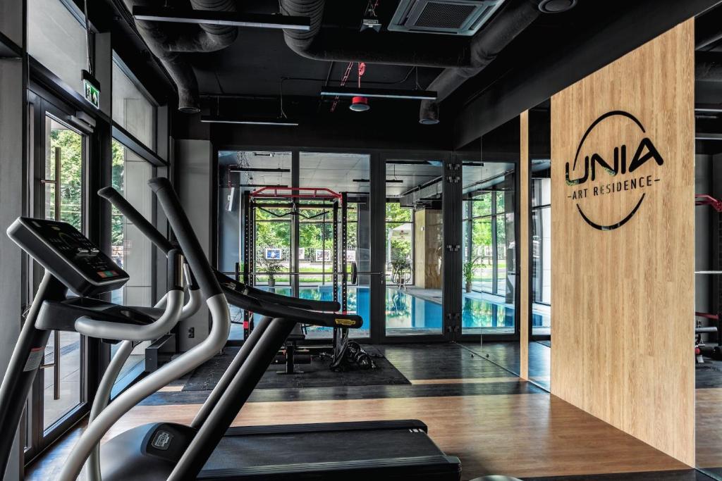 Posilňovňa alebo fitness centrum v ubytovaní PLATiNIUM HOUSE & SPA BASEN-SAUNA CENTRUM