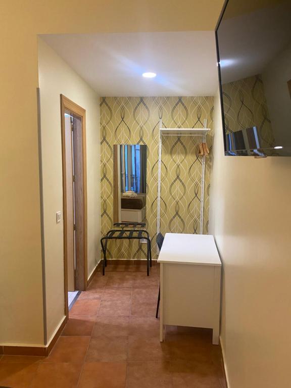 TV a/nebo společenská místnost v ubytování Hostal Alaska