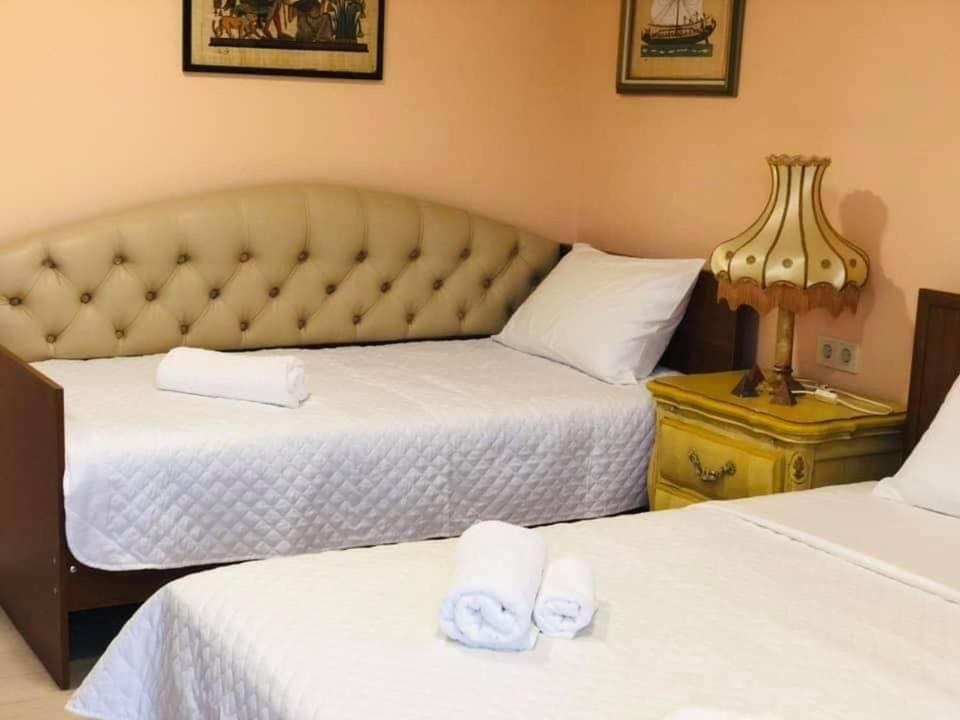 Postel nebo postele na pokoji v ubytování Villa Gardenia Ureki