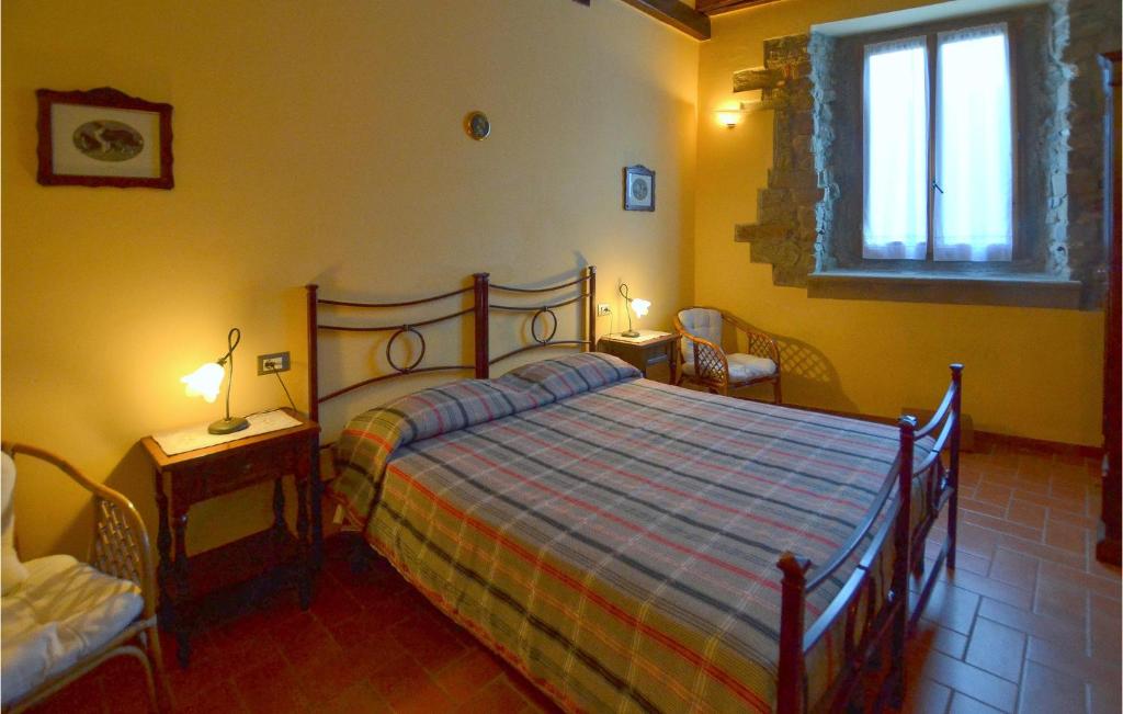 Posteľ alebo postele v izbe v ubytovaní La Casella- La Terrazza