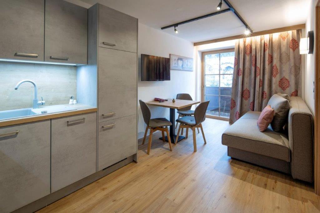 Kuchyň nebo kuchyňský kout v ubytování Hotel Gasthof Obermair