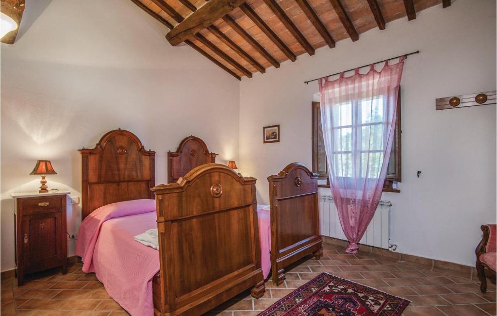 A bed or beds in a room at Poggio Napoleone