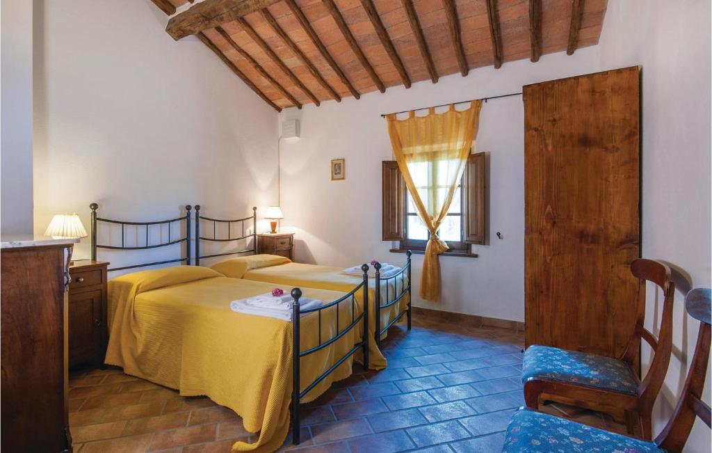 A bed or beds in a room at Poggio Napoleone