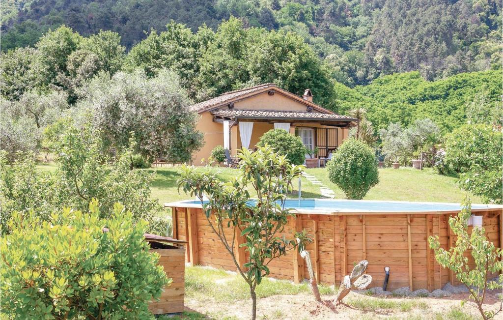 a house with a swimming pool in a garden at Polla in Cerasomma