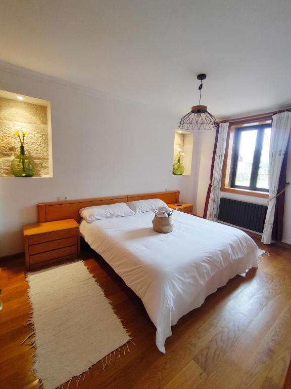 Postel nebo postele na pokoji v ubytování Albergue Villa San Clemente