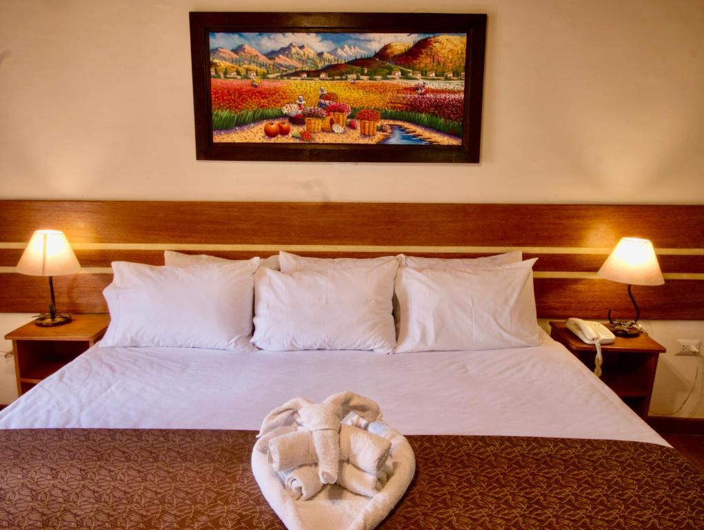 Voodi või voodid majutusasutuse Sol Ollantay Boutique Hotel toas