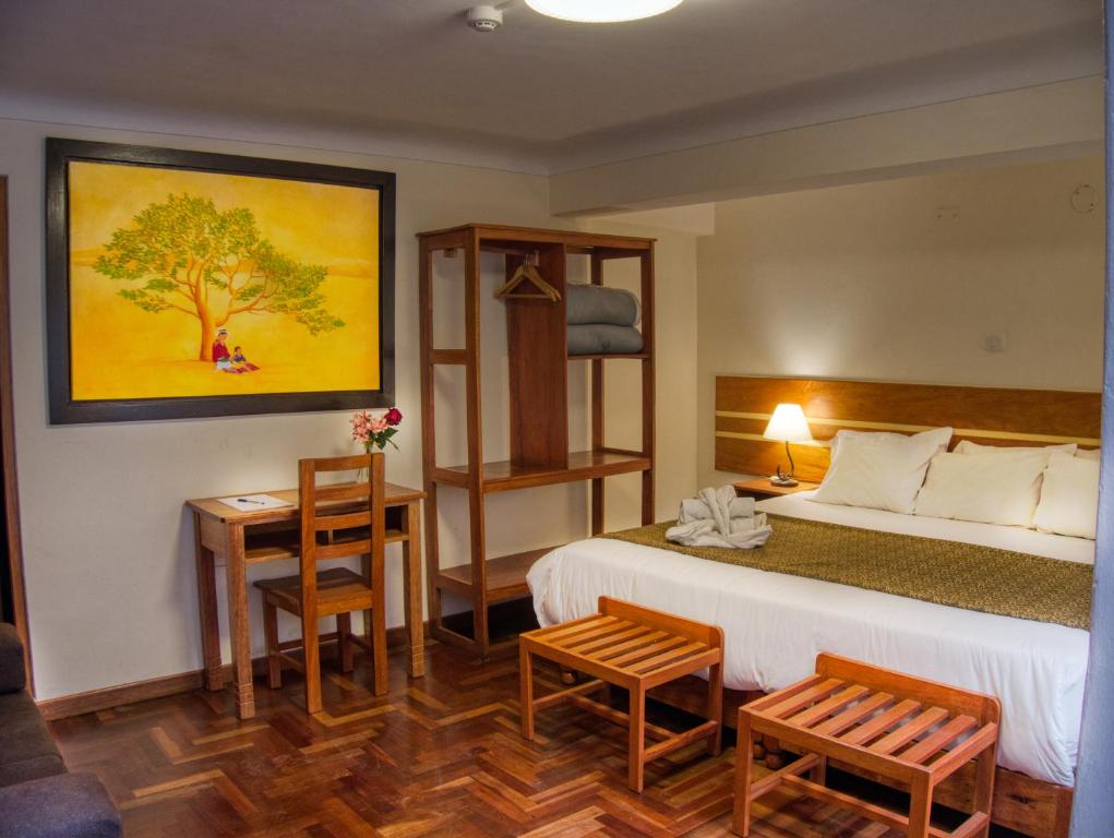Voodi või voodid majutusasutuse Sol Ollantay Boutique Hotel toas