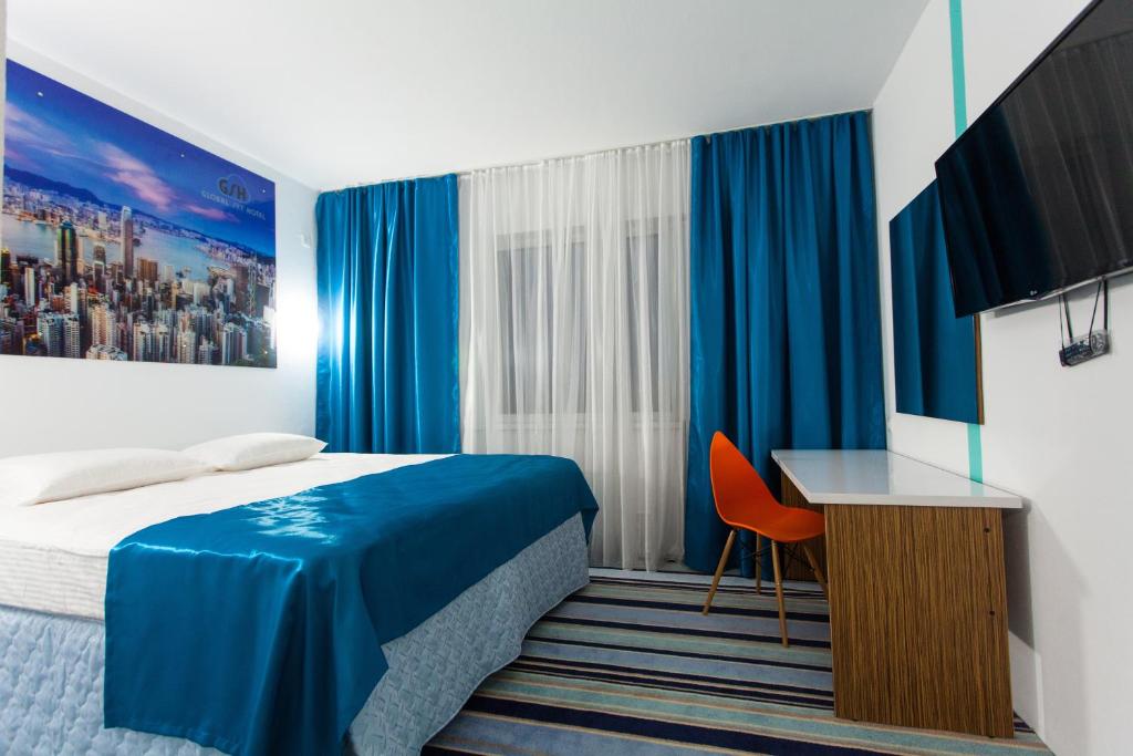 
Кровать или кровати в номере Апартаменты Global Sky
