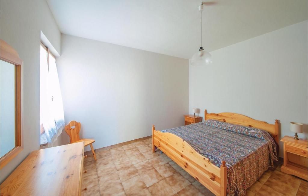 Postel nebo postele na pokoji v ubytování Ginepro