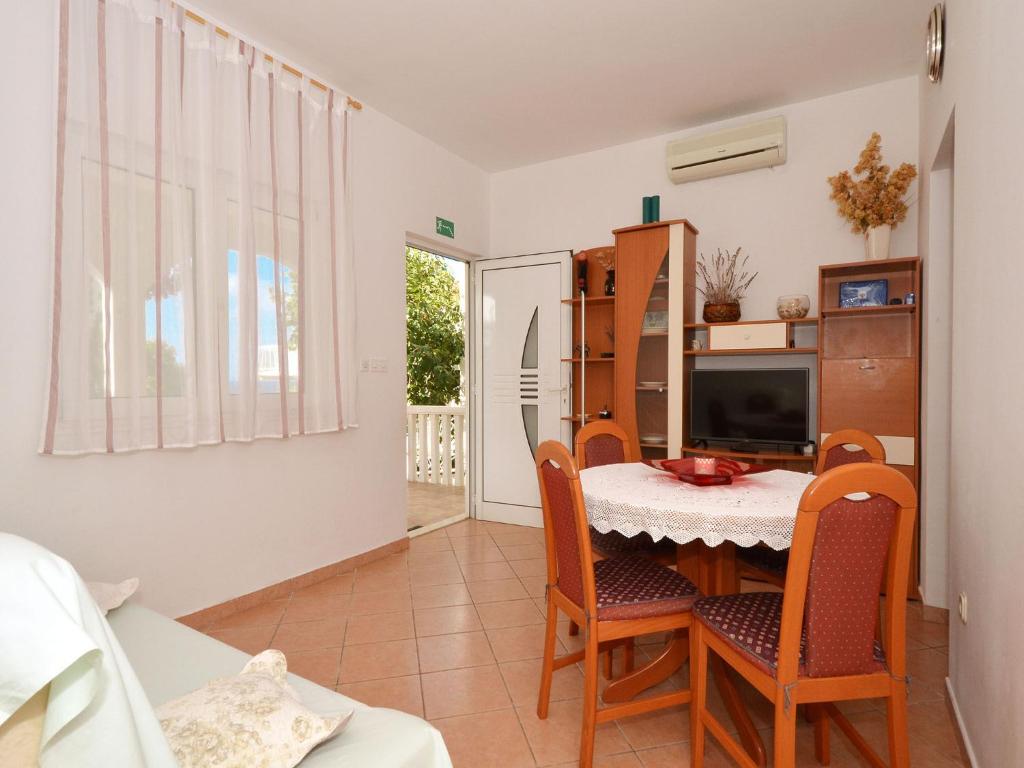Televízia a/alebo spoločenská miestnosť v ubytovaní Apartment NADA